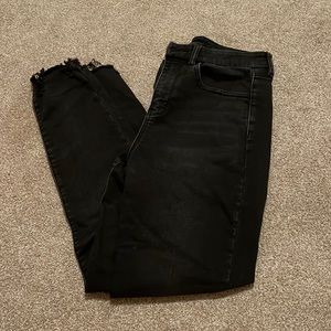 Black skinny jeans with rips